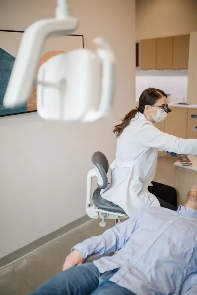Nashville cosmetic dentistry patient consulting with Dr. D'Aoust for smile makeover