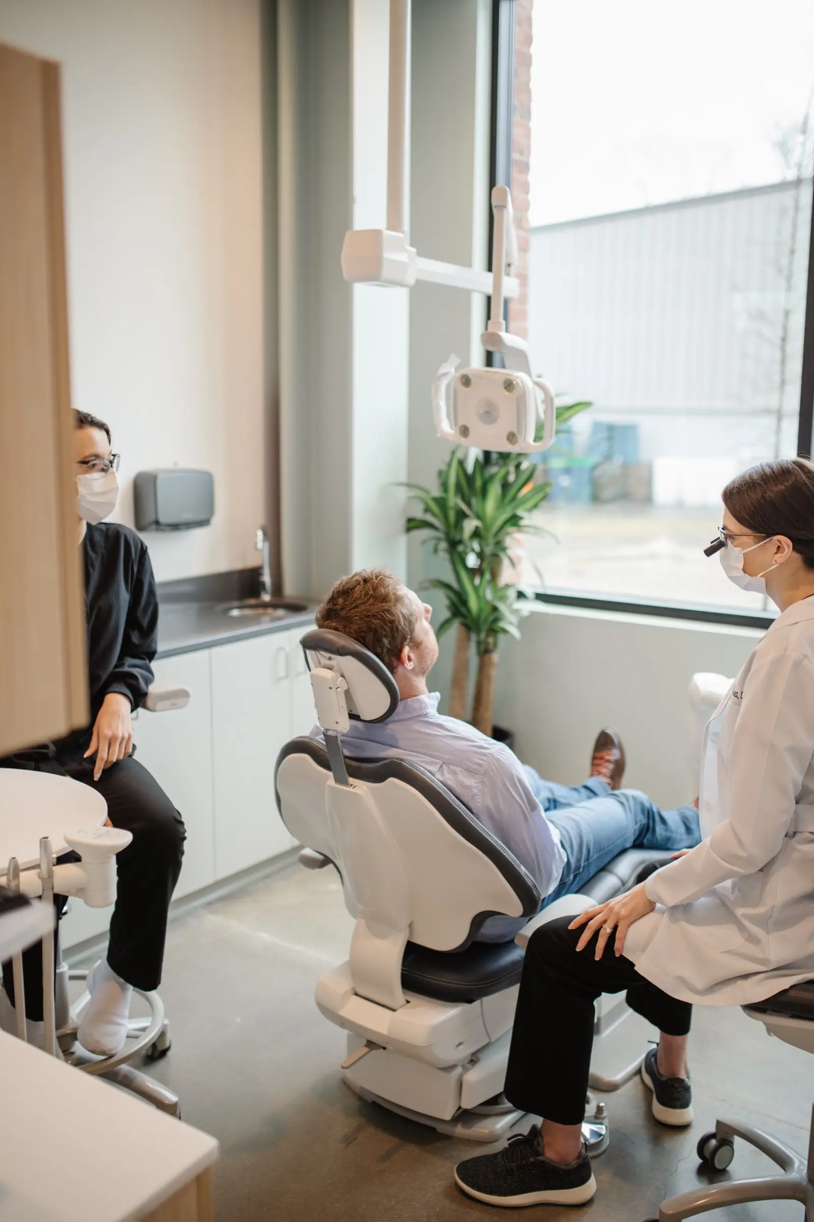 Dr. Diana D'Aoust talking with a patient at Nations Dental Studio in Nashville